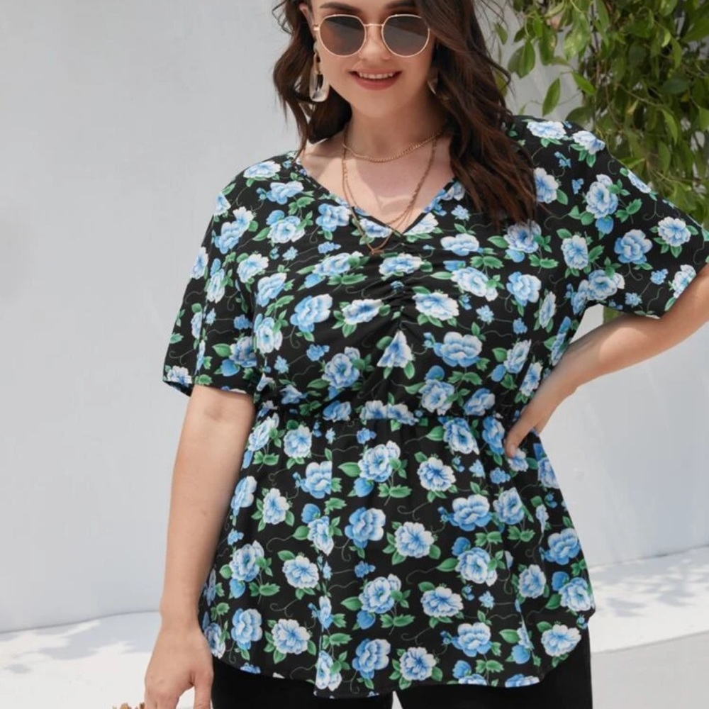 Floral peplum NWOT